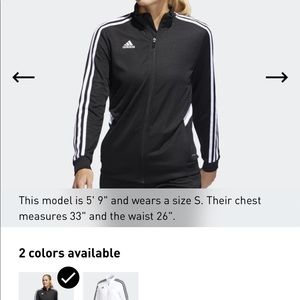 Red Adidas track suit.